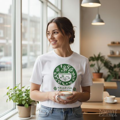Woman wearing a white t-shirt with a green logo in a cafe setting